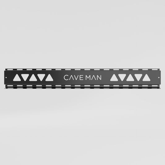 A black metal mounting rail with triangular cutouts on both ends and the text 'CAVE MAN' in the center, shown against a light gray gradient background.